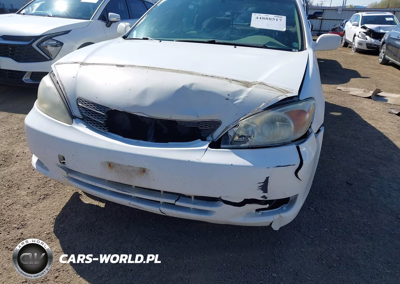 2002 Toyota Camry Le VIN:JTDBE30K120025487 - 6