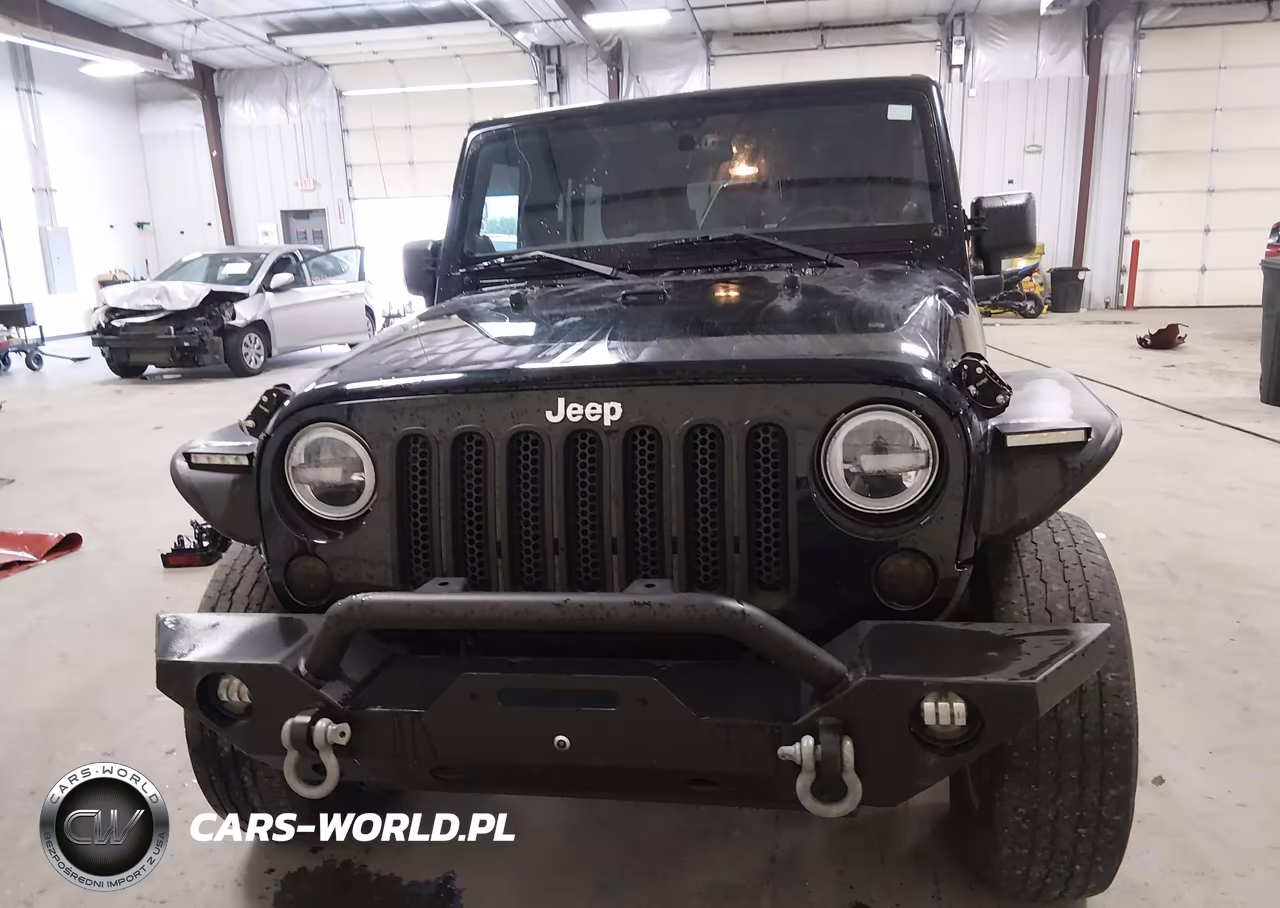 2012 Jeep Wrangler Unlimited Sport VIN:1C4BJWDG2CL141915 - 13