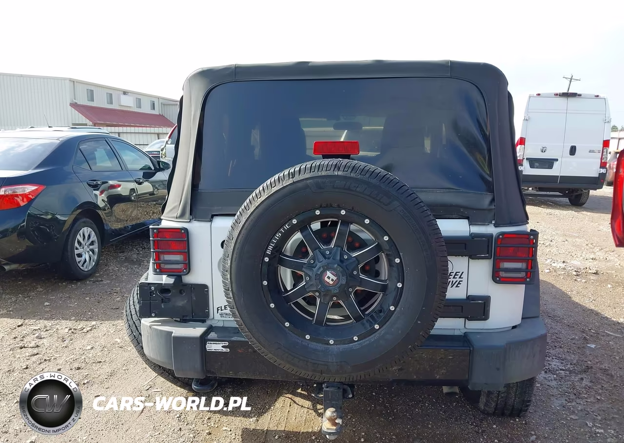 2015 Jeep Wrangler Willys Wheeler VIN:1C4AJWAG1FL756623 - 16