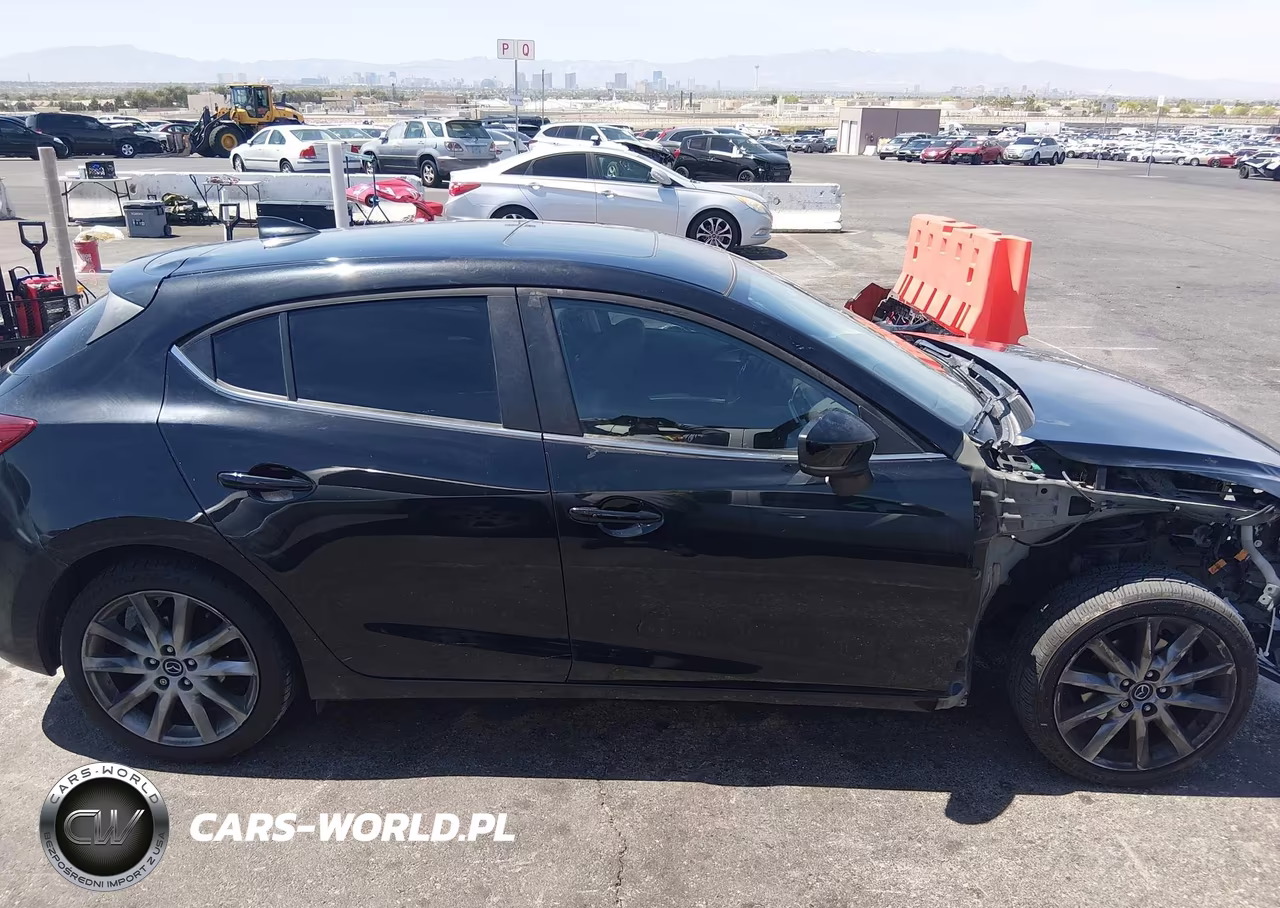 2018 Mazda Mazda3 Touring VIN:3MZBN1L32JM264919 - 14