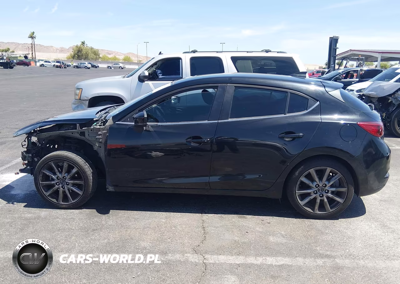 2018 Mazda Mazda3 Touring VIN:3MZBN1L32JM264919 - 15