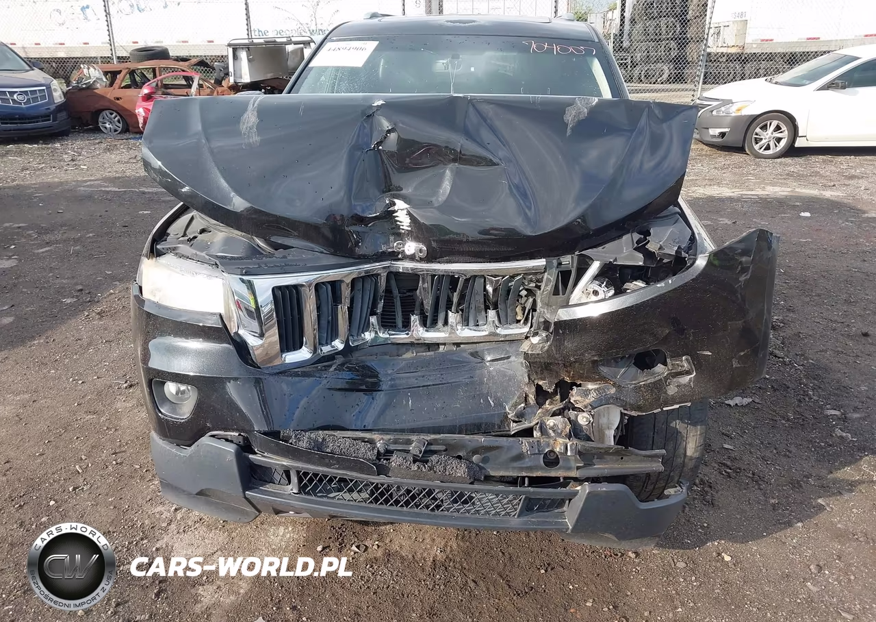 2011 Jeep Grand Cherokee Laredo VIN:1J4RR4GG0BC704007 - 11