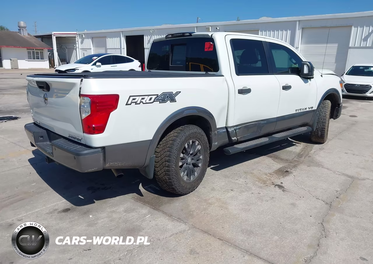 2018 Nissan Titan Pro-4X VIN:1N6AA1E58JN509833 - 4