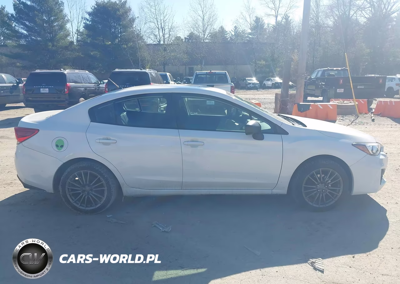 SUBARU IMPREZA VIN:4S3GKAA60K3601878 - 13