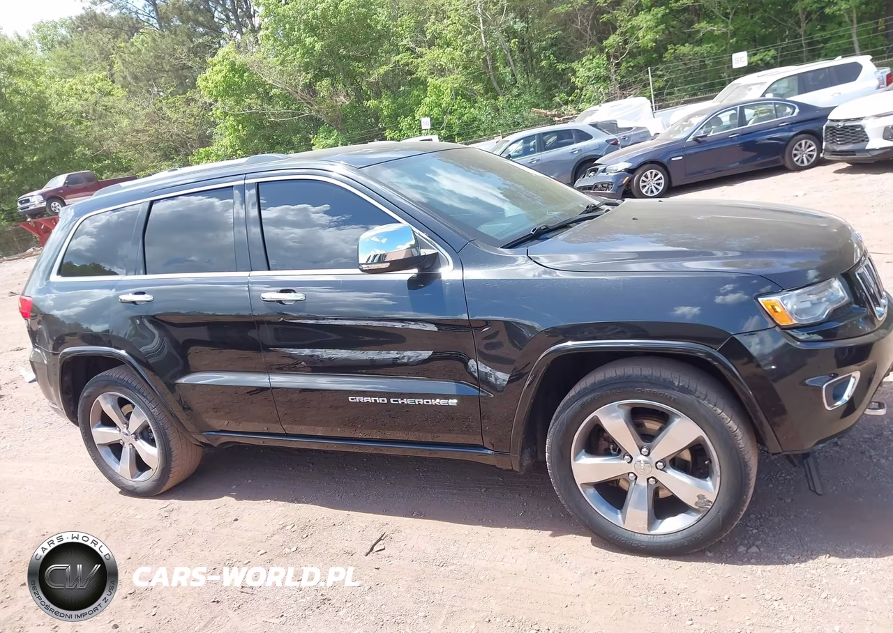 2015 Jeep Grand Cherokee Overland VIN:1C4RJECG7FC957453 - 13