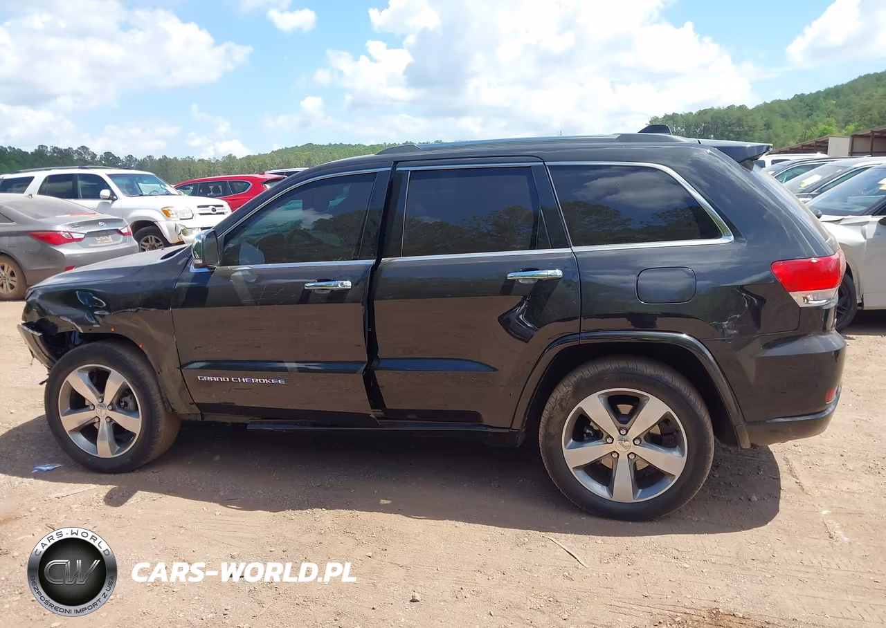 2015 Jeep Grand Cherokee Overland VIN:1C4RJECG7FC957453 - 14