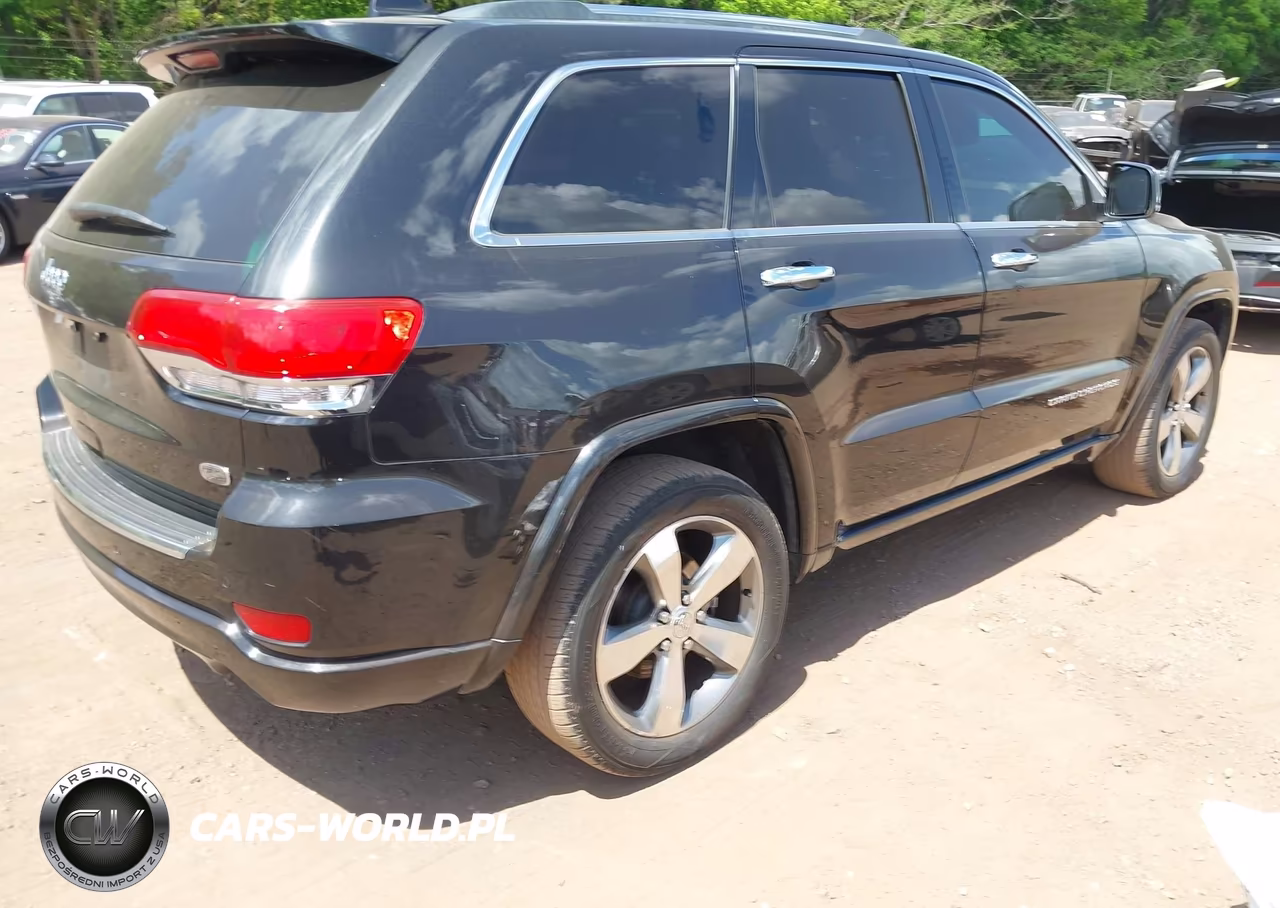 2015 Jeep Grand Cherokee Overland VIN:1C4RJECG7FC957453 - 4