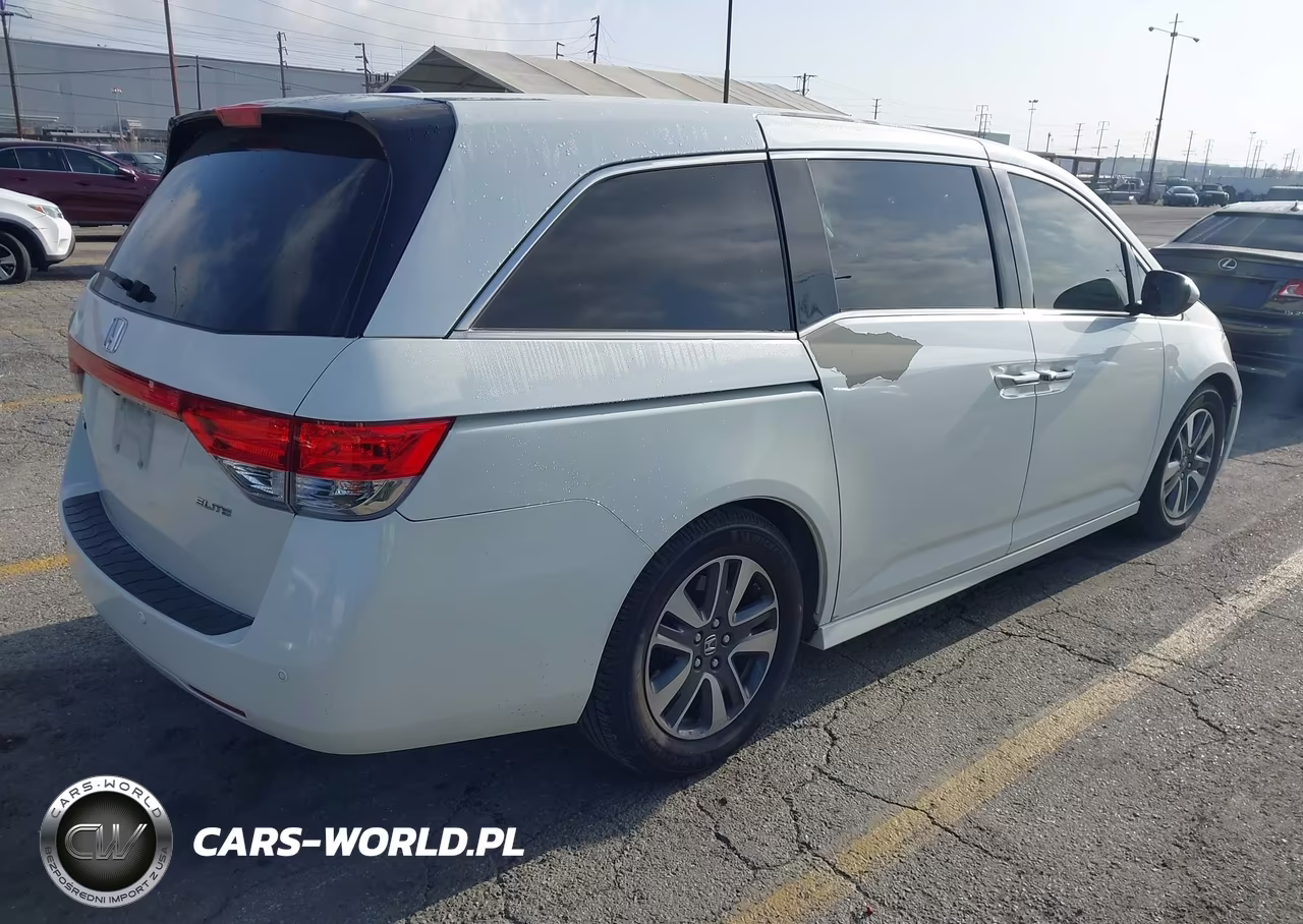 2014 Honda Odyssey Touring-Touring Elite VIN:5FNRL5H97EB093042 - 4