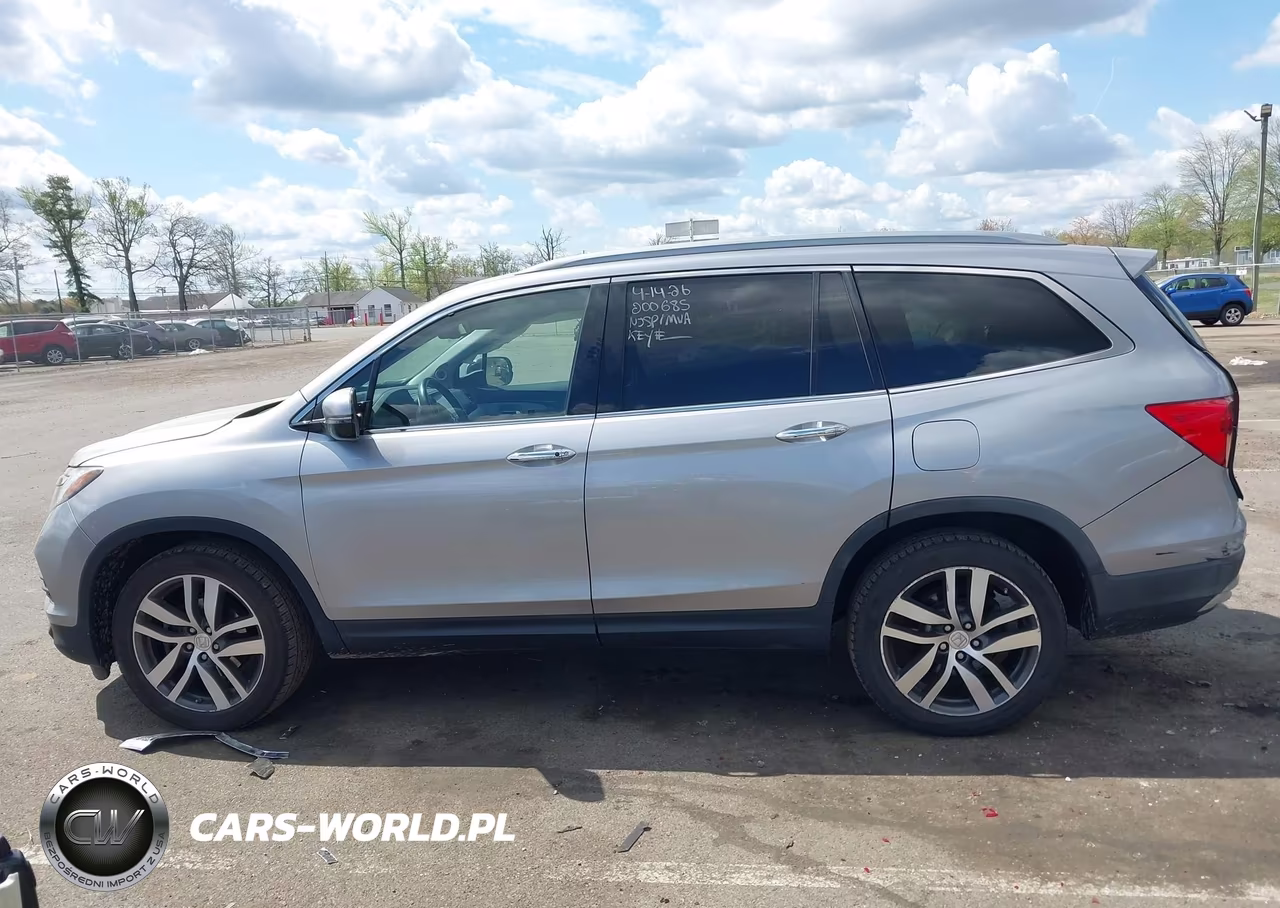2016 Honda Pilot Touring VIN:5FNYF6H95GB117138 - 14