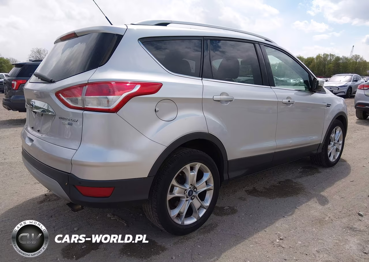 2016 Ford Escape Titanium VIN:1FMCU9J99GUA48579 - 4