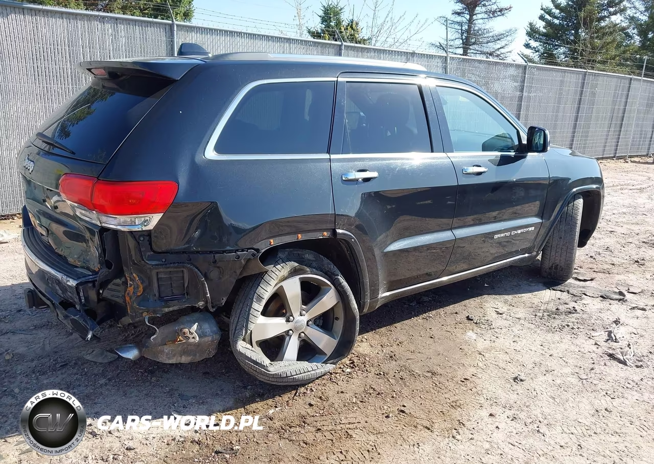 2014 Jeep Grand Cherokee Overland VIN:1C4RJFCG7EC523392 - 4