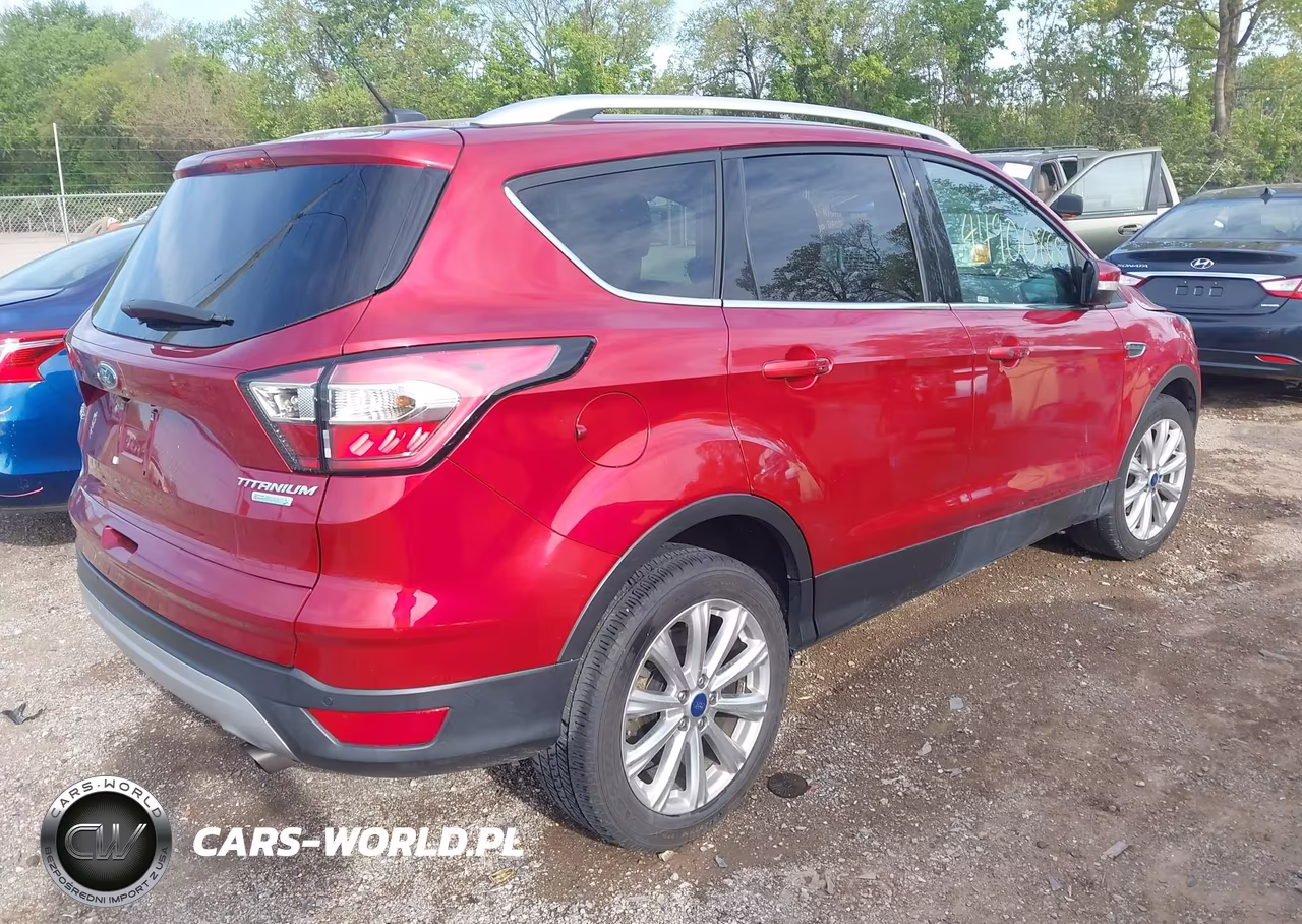 2017 Ford Escape Titanium VIN:1FMCU0J90HUB58742 - 4