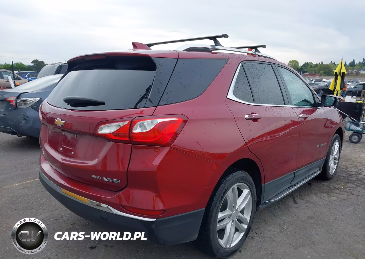 2018 Chevrolet Equinox Premier VIN:3GNAXVEV2JL126194 - 4