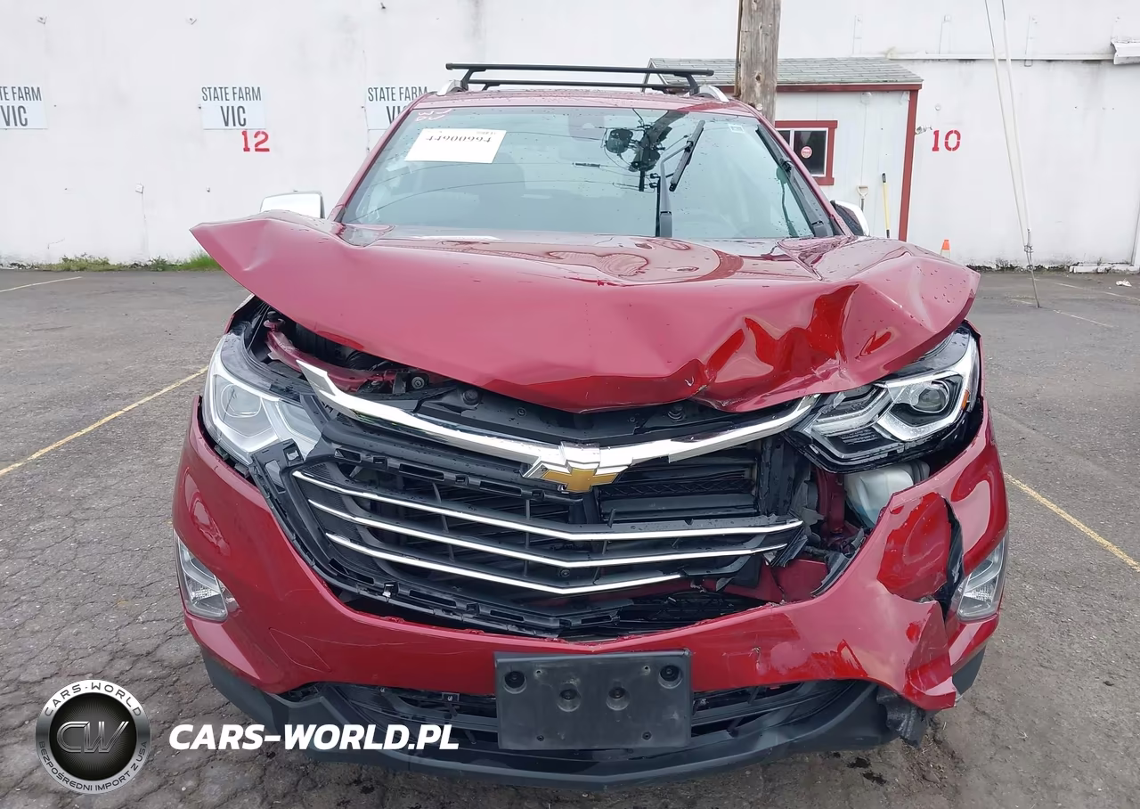 2018 Chevrolet Equinox Premier VIN:3GNAXVEV2JL126194 - 6