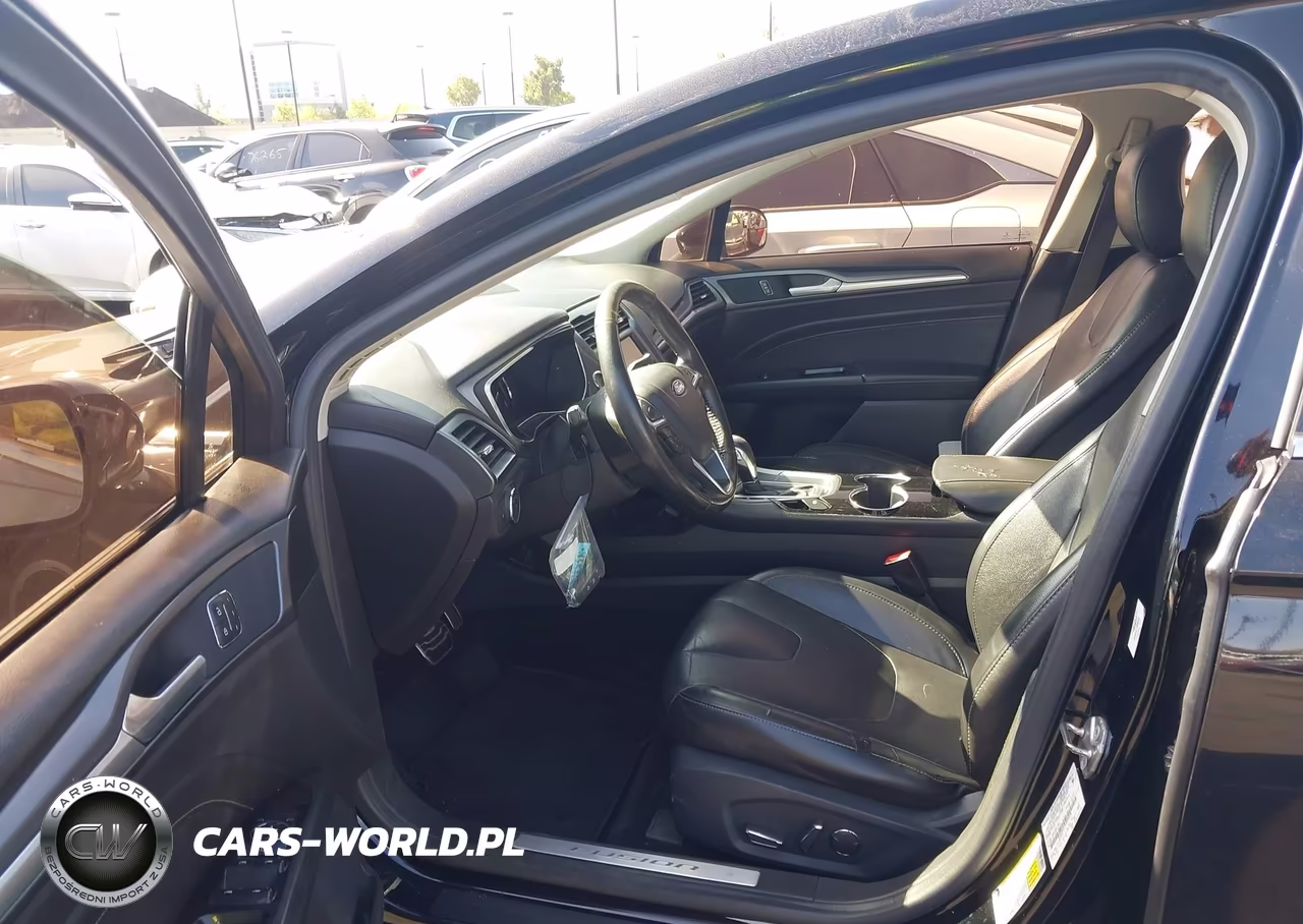 2016 Ford Fusion Energi Titanium VIN:3FA6P0SU7GR229149 - 5