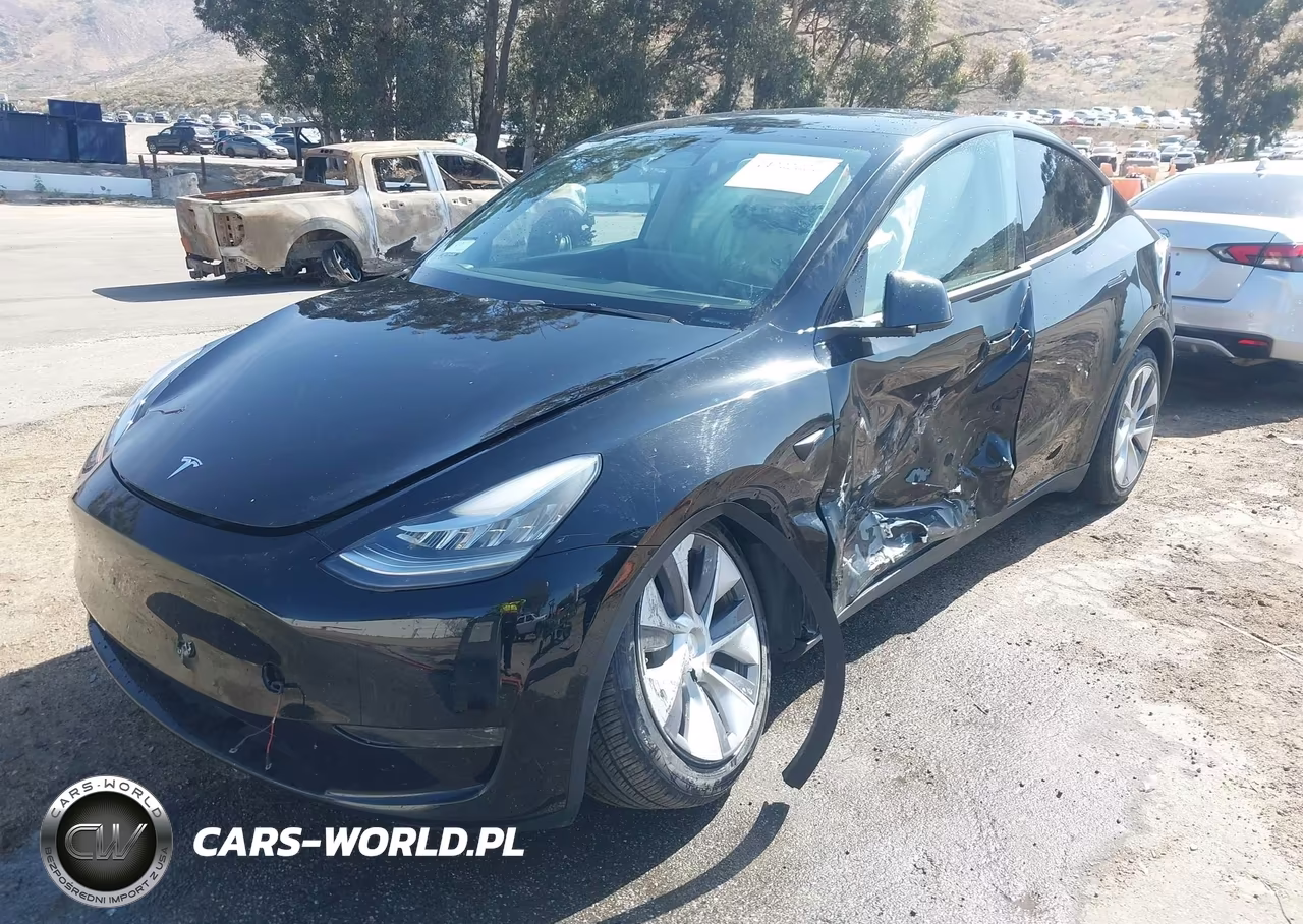 2023 Tesla Model Y Awd-Long Range Dual Motor All-Wheel Drive VIN:7SAYGDEE5PA024493 - 2