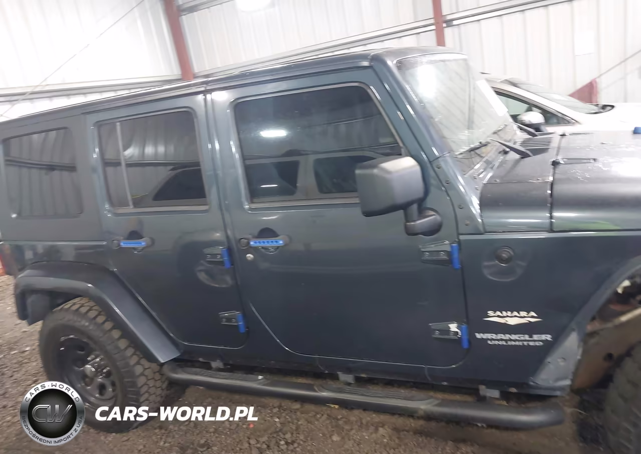 2007 Jeep Wrangler Unlimited Sahara VIN:1J4GA59137L169372 - 14