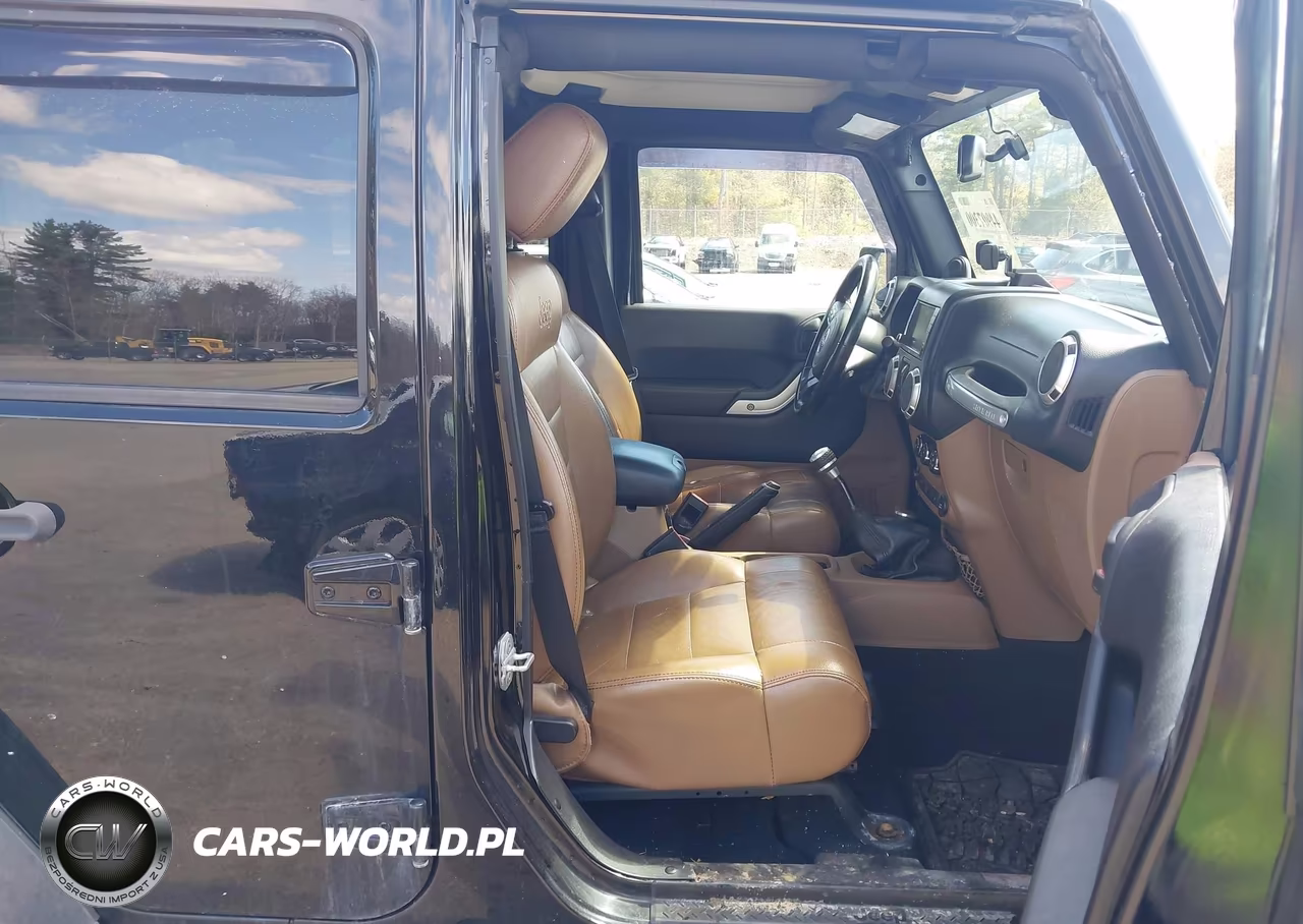 2012 Jeep Wrangler Unlimited Rubicon VIN:1C4BJWFG7CL116456 - 5