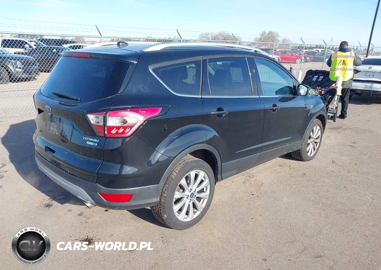 2017 Ford Escape Titanium VIN:1FMCU9J95HUD71335 - 4