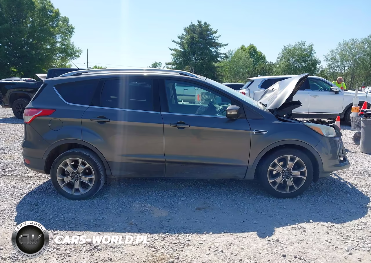 2015 Ford Escape Titanium VIN:1FMCU0JX2FUB80205 - 13