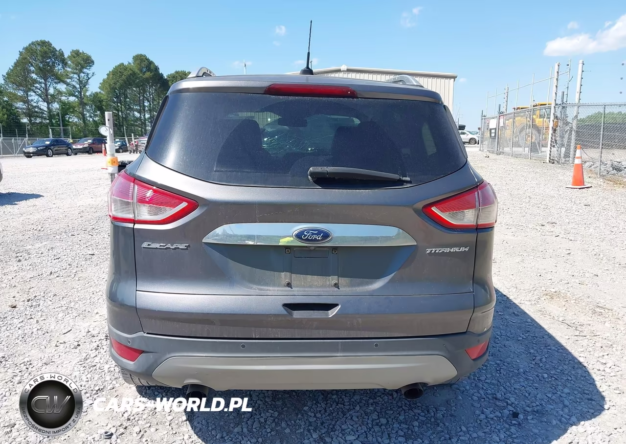 2015 Ford Escape Titanium VIN:1FMCU0JX2FUB80205 - 16