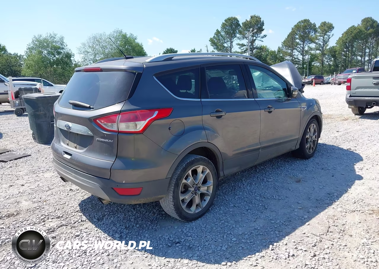 2015 Ford Escape Titanium VIN:1FMCU0JX2FUB80205 - 4