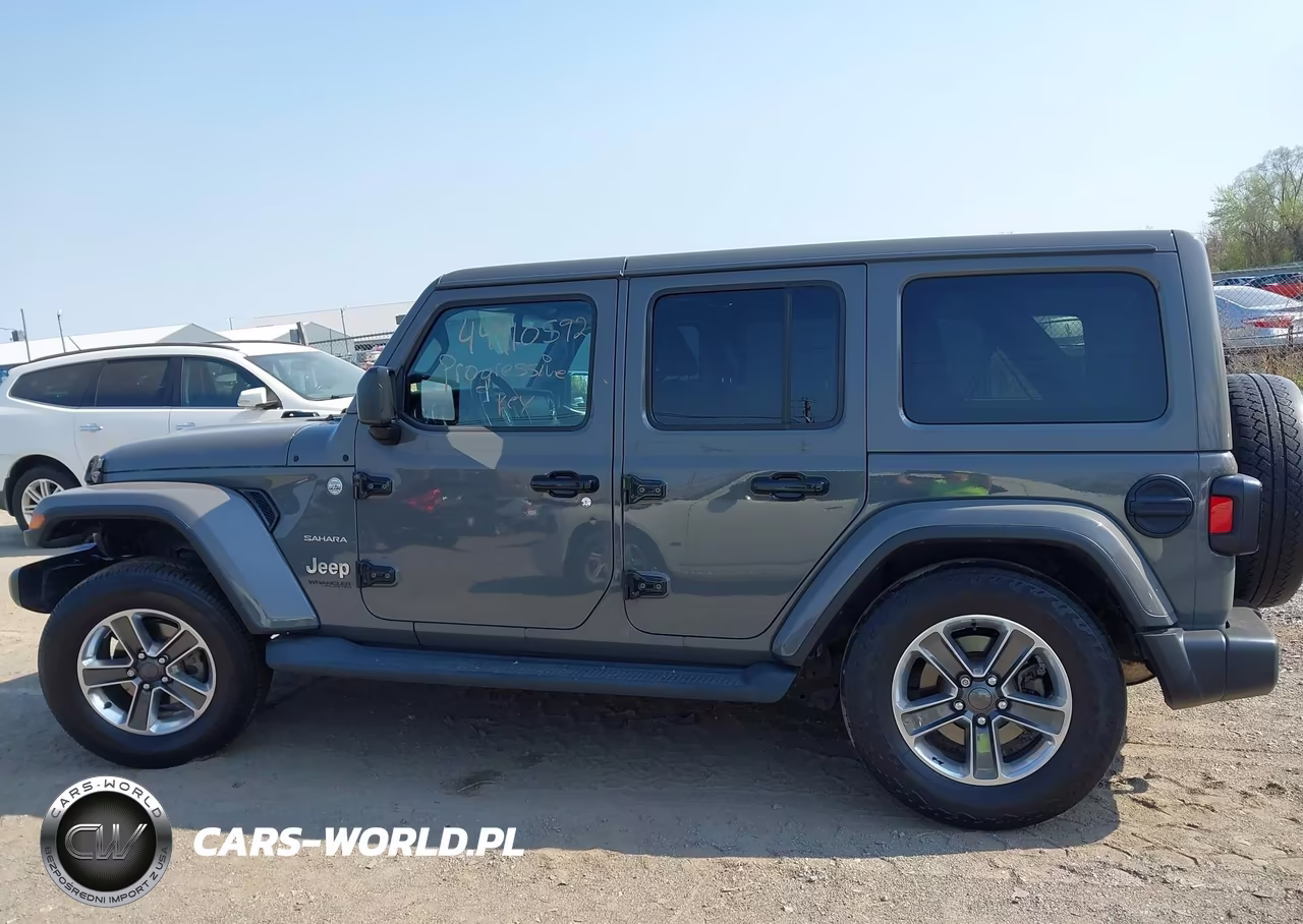 2019 Jeep Wrangler Unlimited Sahara VIN:1C4HJXEG4KW631557 - 14