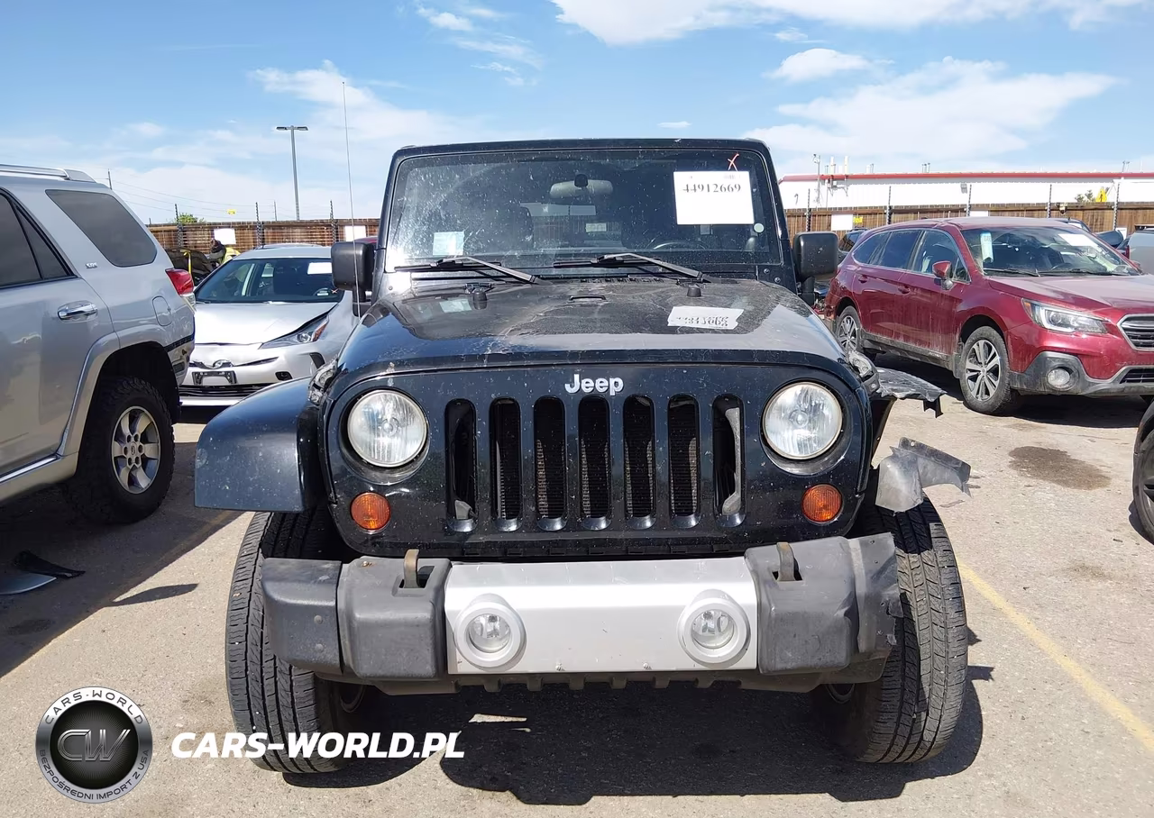 2011 Jeep Wrangler Unlimited Sahara VIN:1J4BA5H12BL522477 - 13
