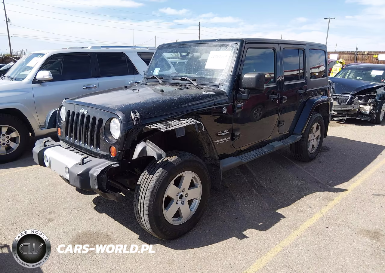 2011 Jeep Wrangler Unlimited Sahara VIN:1J4BA5H12BL522477 - 2
