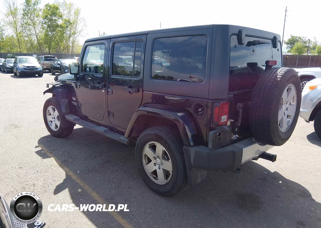 2011 Jeep Wrangler Unlimited Sahara VIN:1J4BA5H12BL522477 - 3