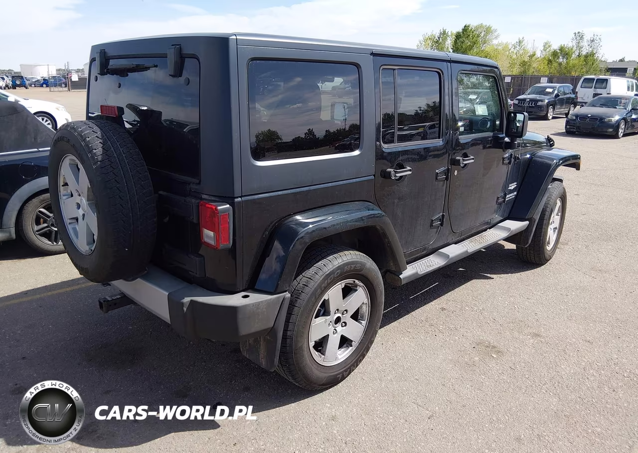 2011 Jeep Wrangler Unlimited Sahara VIN:1J4BA5H12BL522477 - 4
