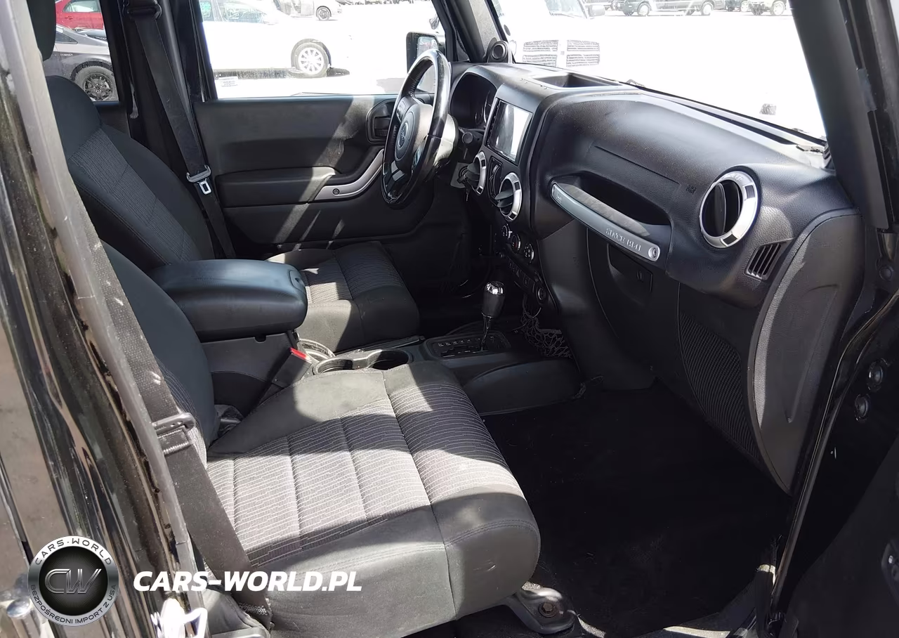 2011 Jeep Wrangler Unlimited Sahara VIN:1J4BA5H12BL522477 - 5