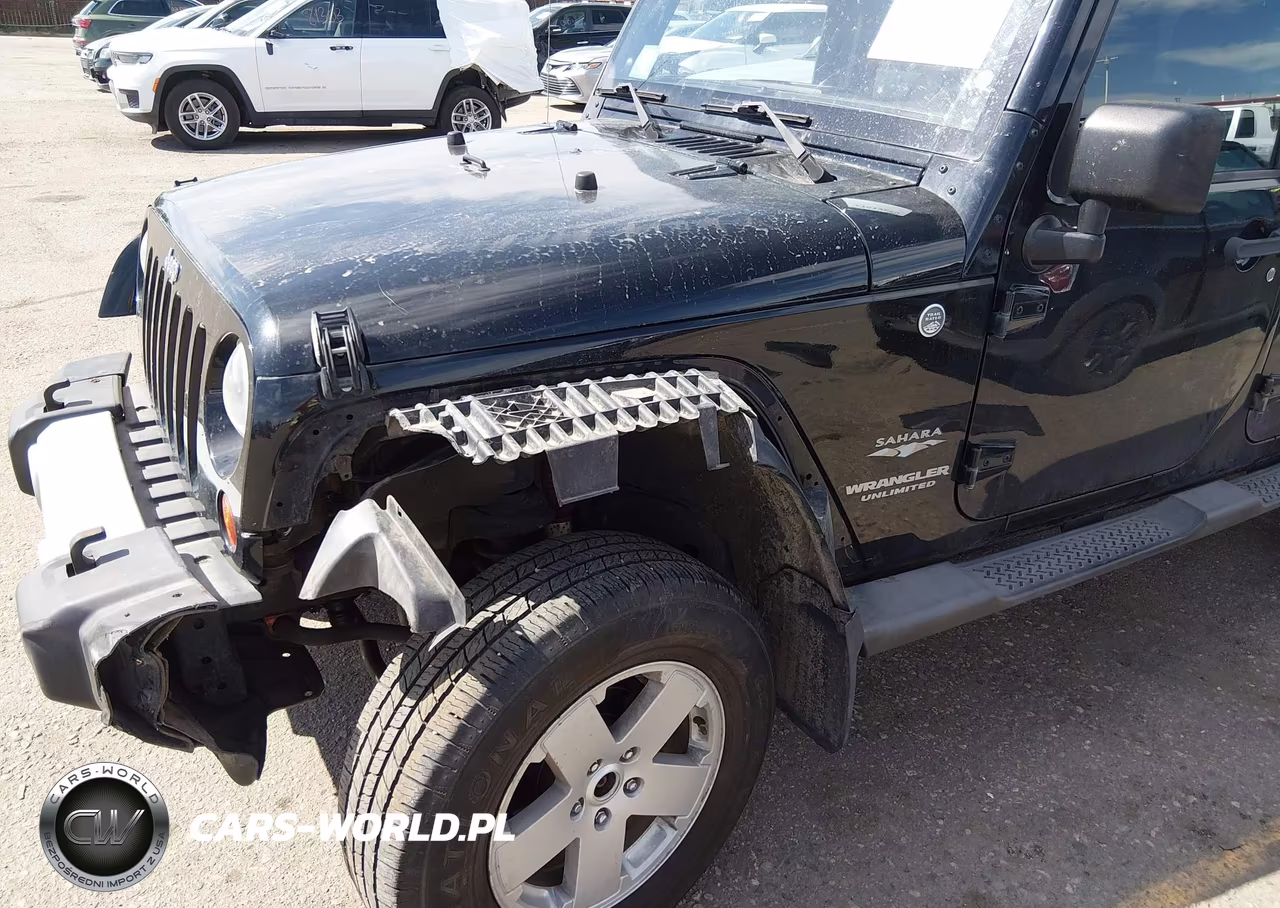 2011 Jeep Wrangler Unlimited Sahara VIN:1J4BA5H12BL522477 - 6