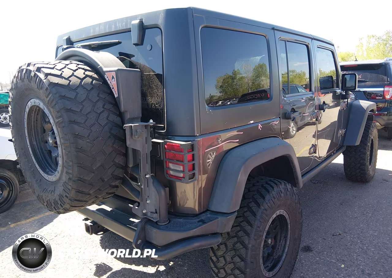 2014 Jeep Wrangler Unlimited Rubicon VIN:1C4BJWFG1EL291692 - 4