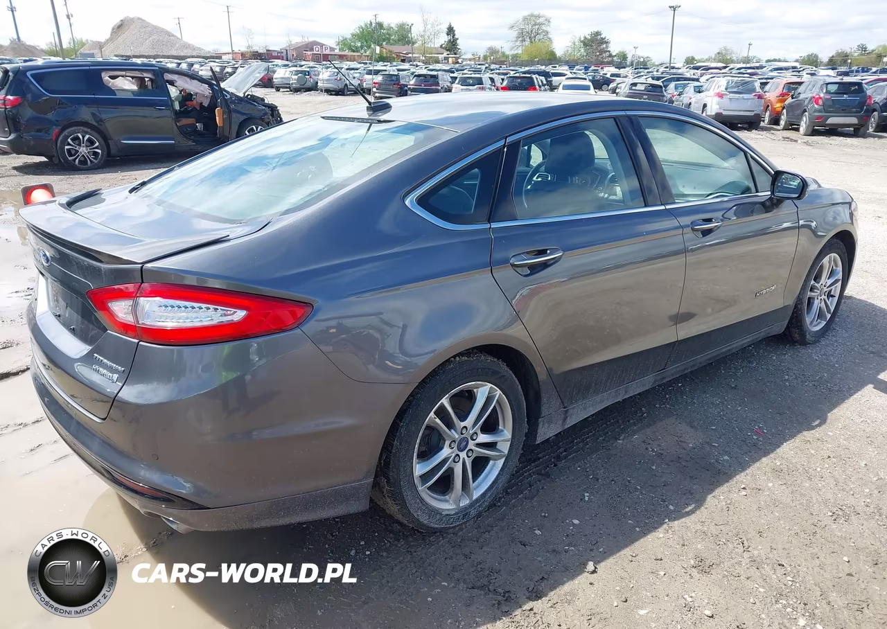 2015 Ford Fusion Hybrid Titanium VIN:3FA6P0RUXFR242692 - 4