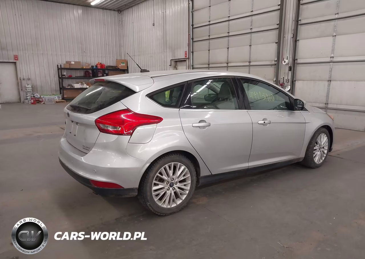 2016 Ford Focus Titanium VIN:1FADP3N21GL299361 - 4