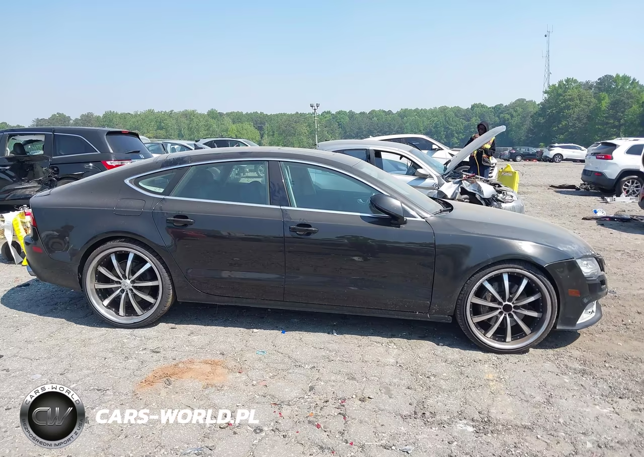 2012 Audi A7 Premium VIN:WAUYGAFC8CN089312 - 13