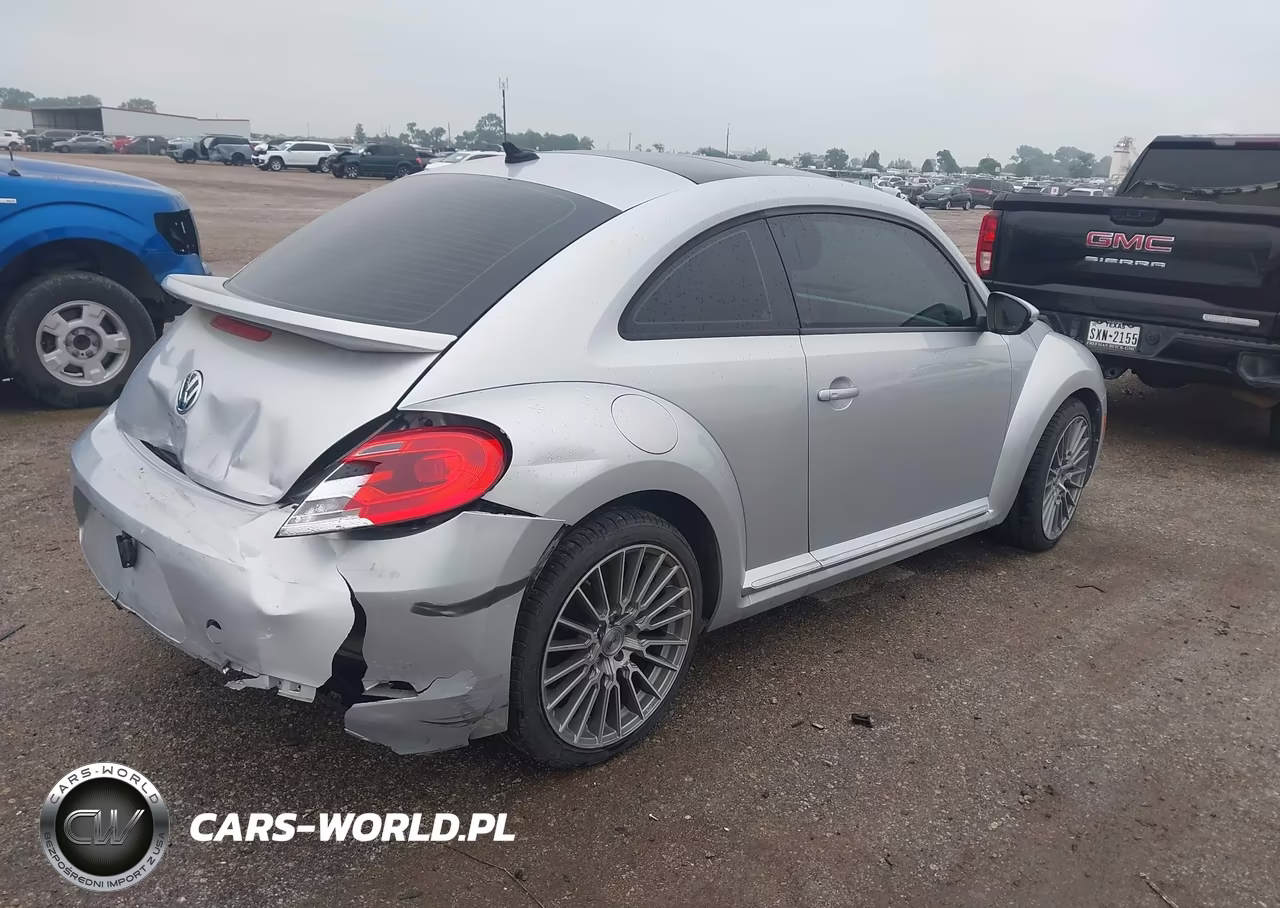 2014 Volkswagen Beetle 2.5L VIN:3VWJX7AT0EM629535 - 4