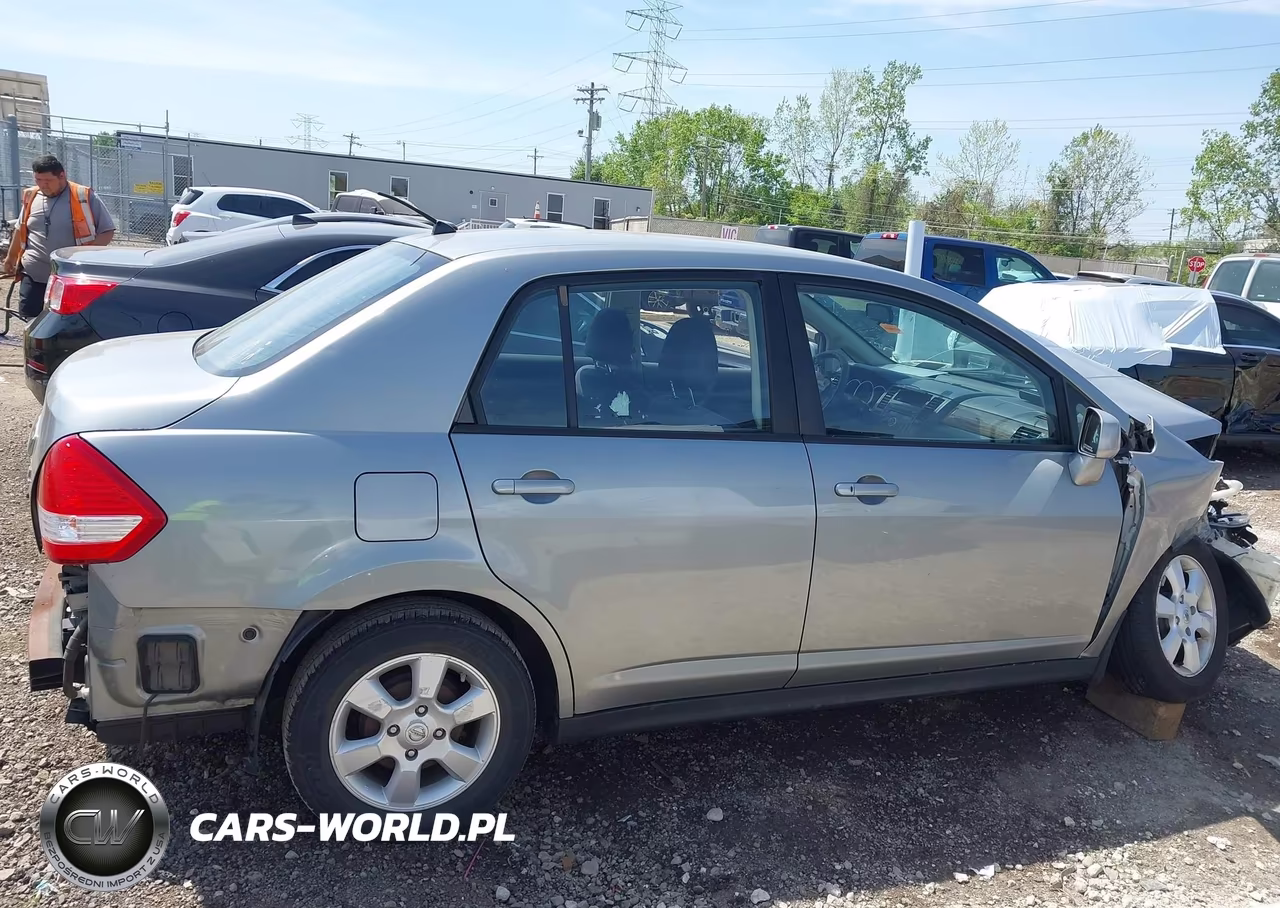 2010 Nissan Versa 1.8Sl VIN:3N1BC1AP1AL371726 - 13