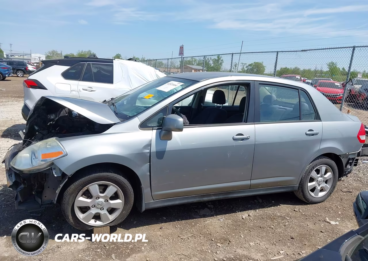 2010 Nissan Versa 1.8Sl VIN:3N1BC1AP1AL371726 - 14