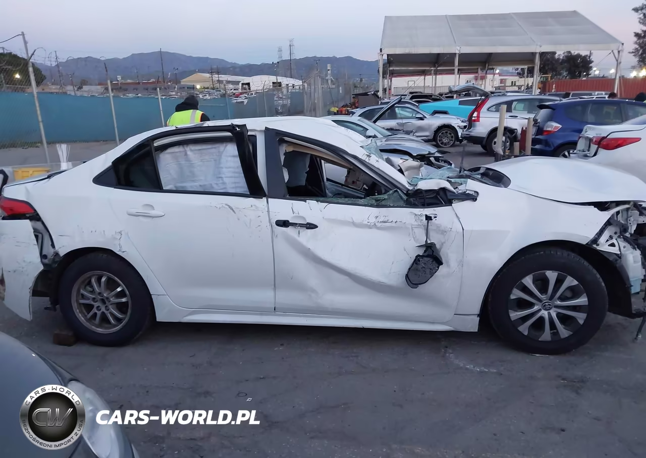 2022 Toyota Corolla Hybrid Le VIN:JTDEAMDE6N3001773 - 13