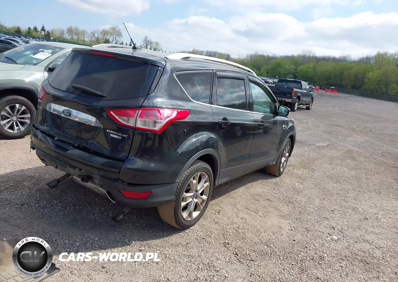 2015 Ford Escape Titanium VIN:1FMCU9J91FUB69797 - 4