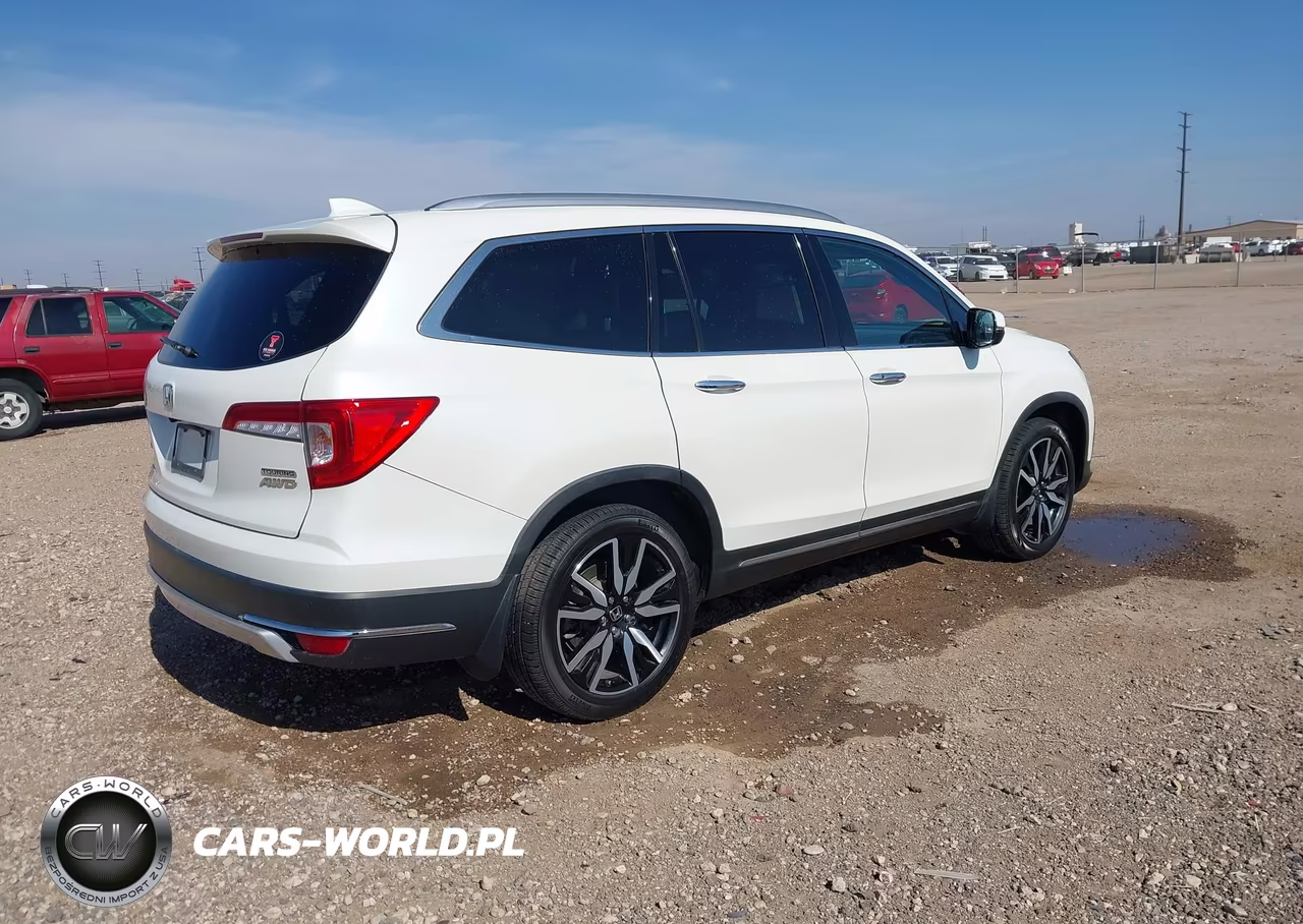 2019 Honda Pilot Touring VIN:5FNYF6H67KB002068 - 4