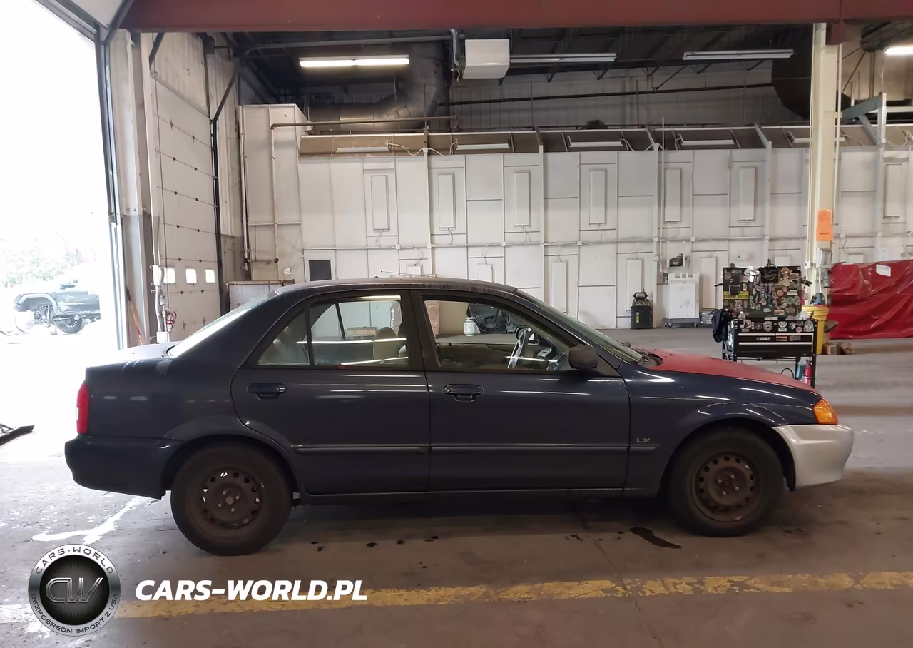 2000 Mazda Protege Dx-Lx VIN:JM1BJ2223Y0305441 - 13