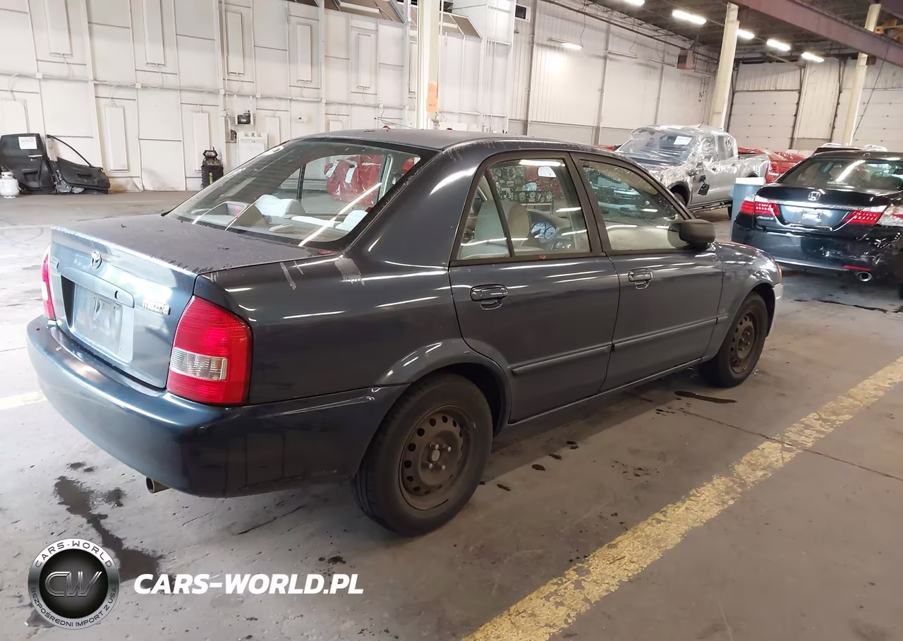 2000 Mazda Protege Dx-Lx VIN:JM1BJ2223Y0305441 - 4