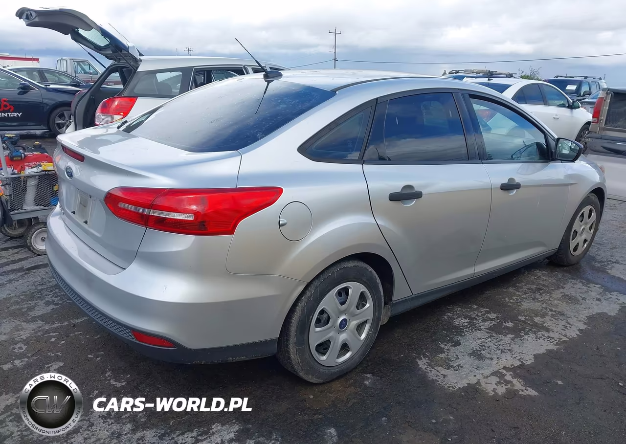 2017 Ford Focus S VIN:1FADP3E21HL314880 - 4