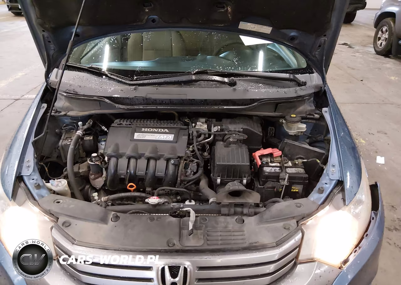 2010 Honda Insight Ex VIN:JHMZE2H7XAS037387 - 10