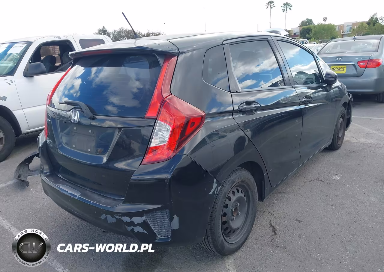 2015 Honda Fit Lx VIN:3HGGK5H58FM713094 - 4