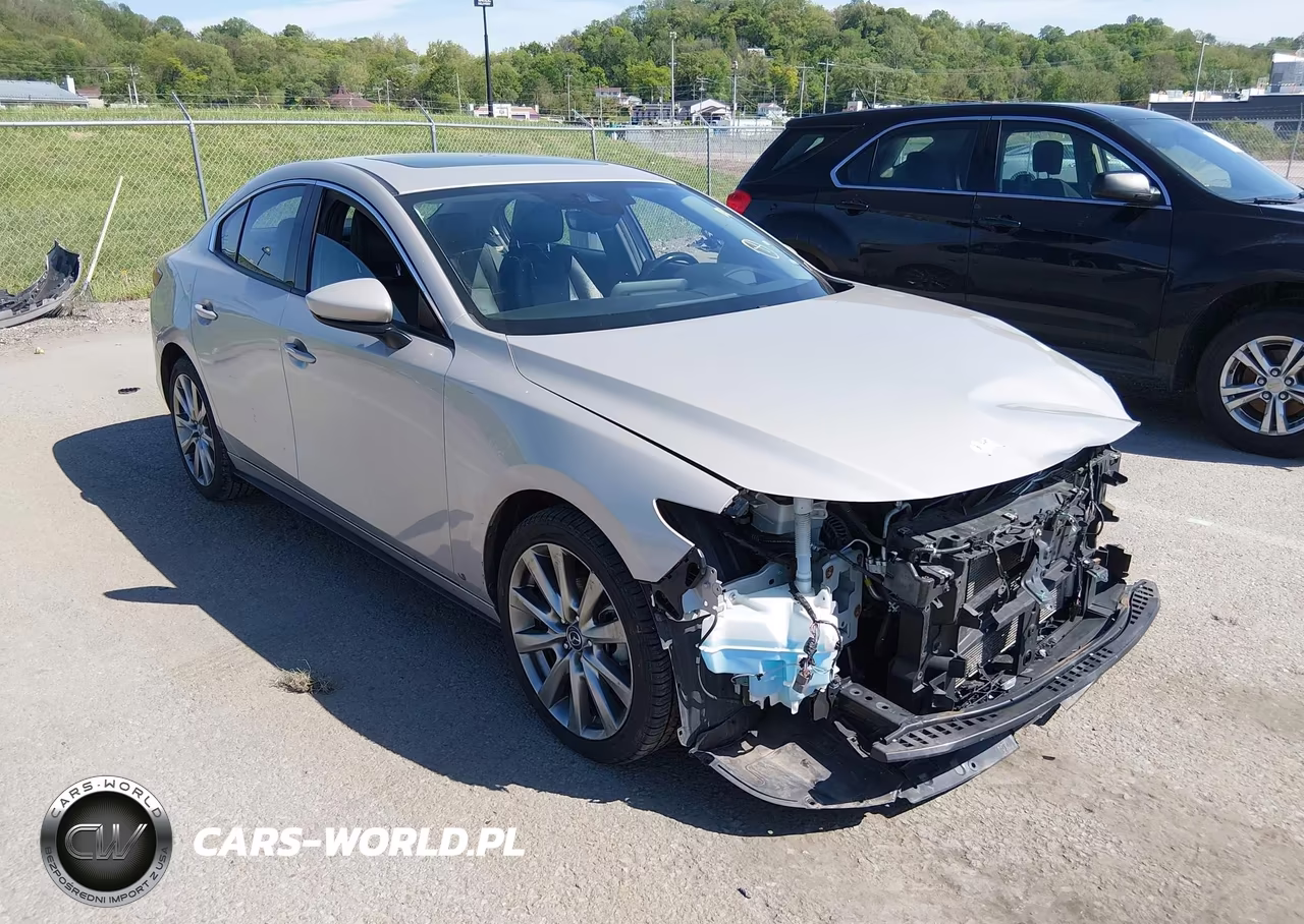 2022 Mazda Mazda3 Premium VIN:3MZBPADLXNM317137 - 18