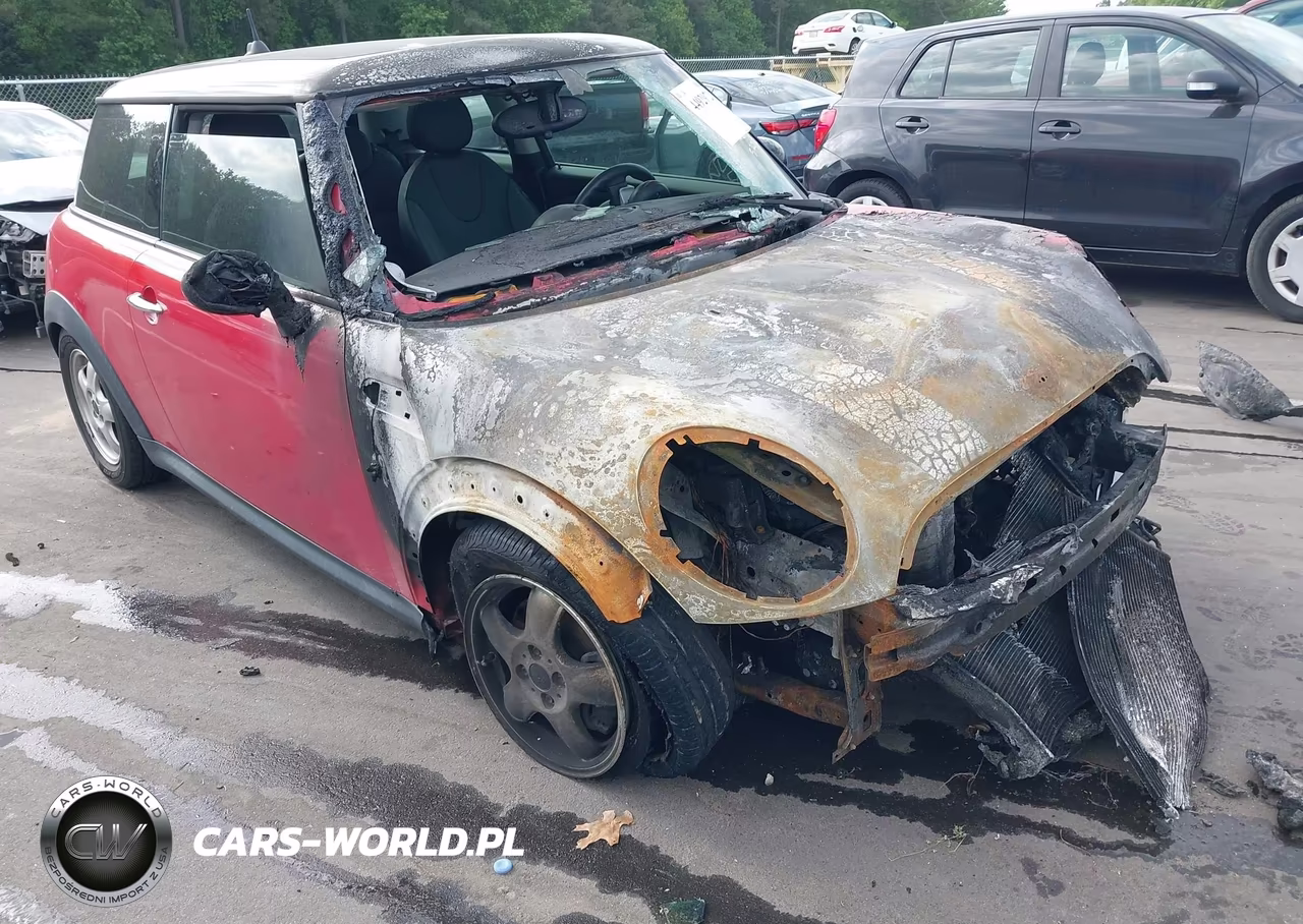 2008 Mini Cooper VIN:WMWMF33538TT65143 - 12